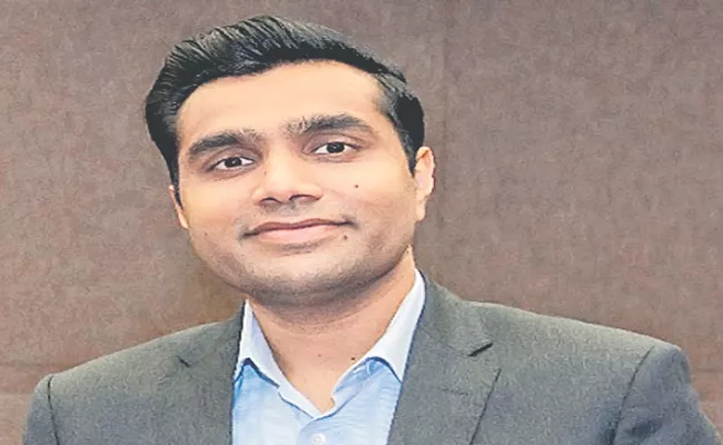 Karan Adani to oversee newly acquired cement companies - Sakshi