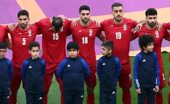 Iran players stay silent for anthem in apparent support for protests - Sakshi