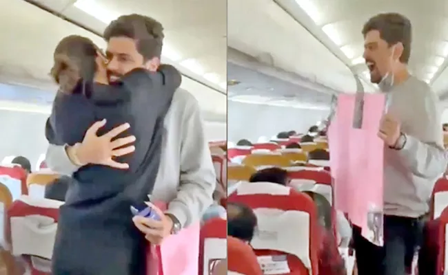 Man Surprises Girlfriend On Flight, Proposes Mid Air Video Goes Viral - Sakshi