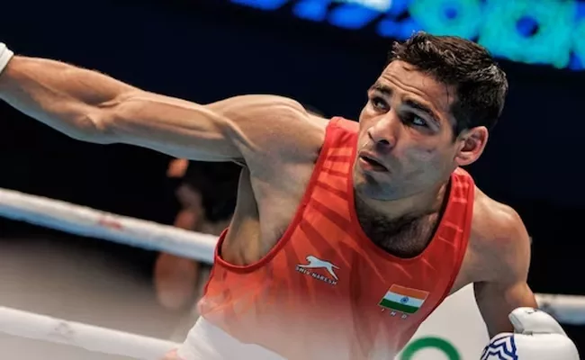 Boxing World Championships: Hussamuddin Into Quarters - Sakshi