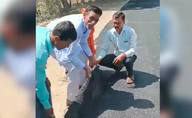 Video: Maharashtra Villagers Lifting Newly Made Road With Bare Hands - Sakshi