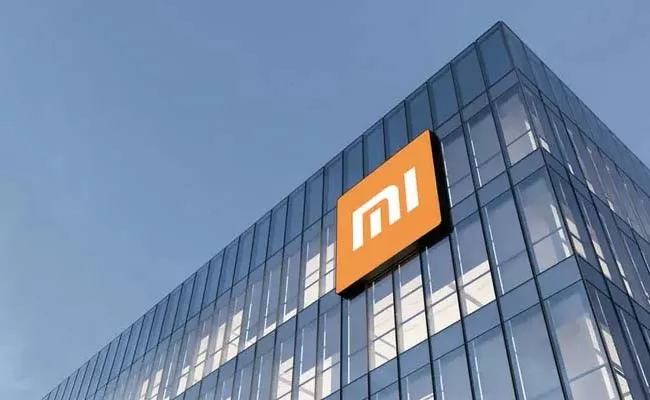 ED issues show cause notice to Xiaomi india - Sakshi