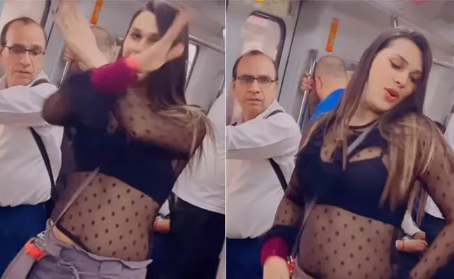 Woman Dancing To Bollywood Song Inside Delhi Metro - Sakshi