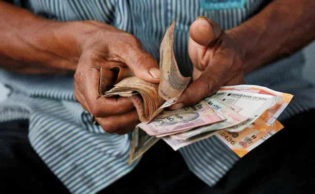 Centre Mulls Tweaks In Nps To Offer Assured Base Pensions To Govt Employees - Sakshi