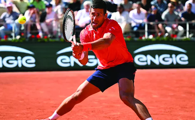 Novak Djokovic reached quarter finals for 17th time in French Open - Sakshi