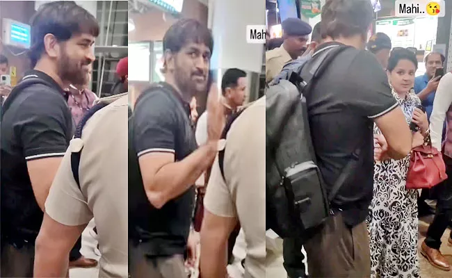 Fan Asks-About Injured Knee At Airport MS Dhoni Epic-Reaction Viral - Sakshi