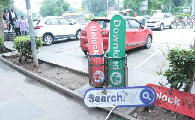 search unlock and download buttons seen in the dustbin - Sakshi