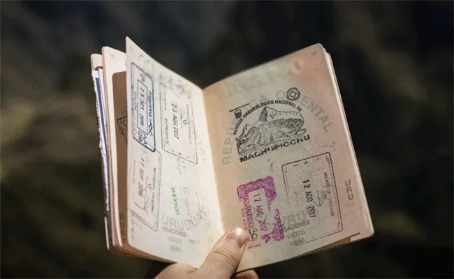 woman conned into paying rs 82000 in bali for a dirty passport - Sakshi