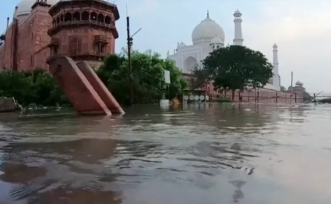 Yamuna flood water reach Taj Mahal walls after 45 years - Sakshi