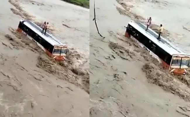 Haridwar UP Roadways Bus Gets Stuck Flooded Causeway - Sakshi