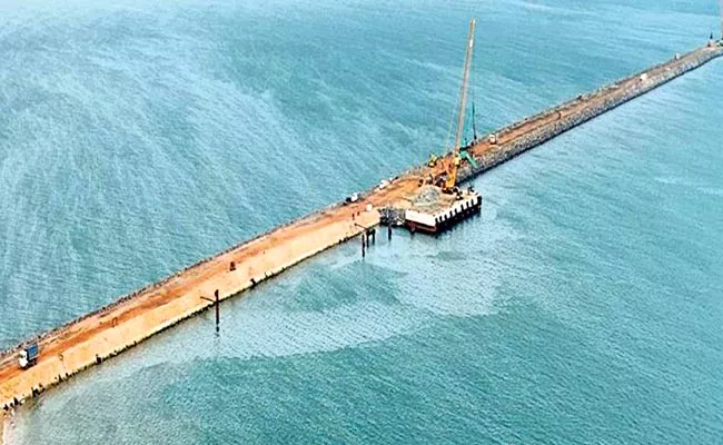 Construction of Ramayapatnam Port is progressing at a fast pace - Sakshi