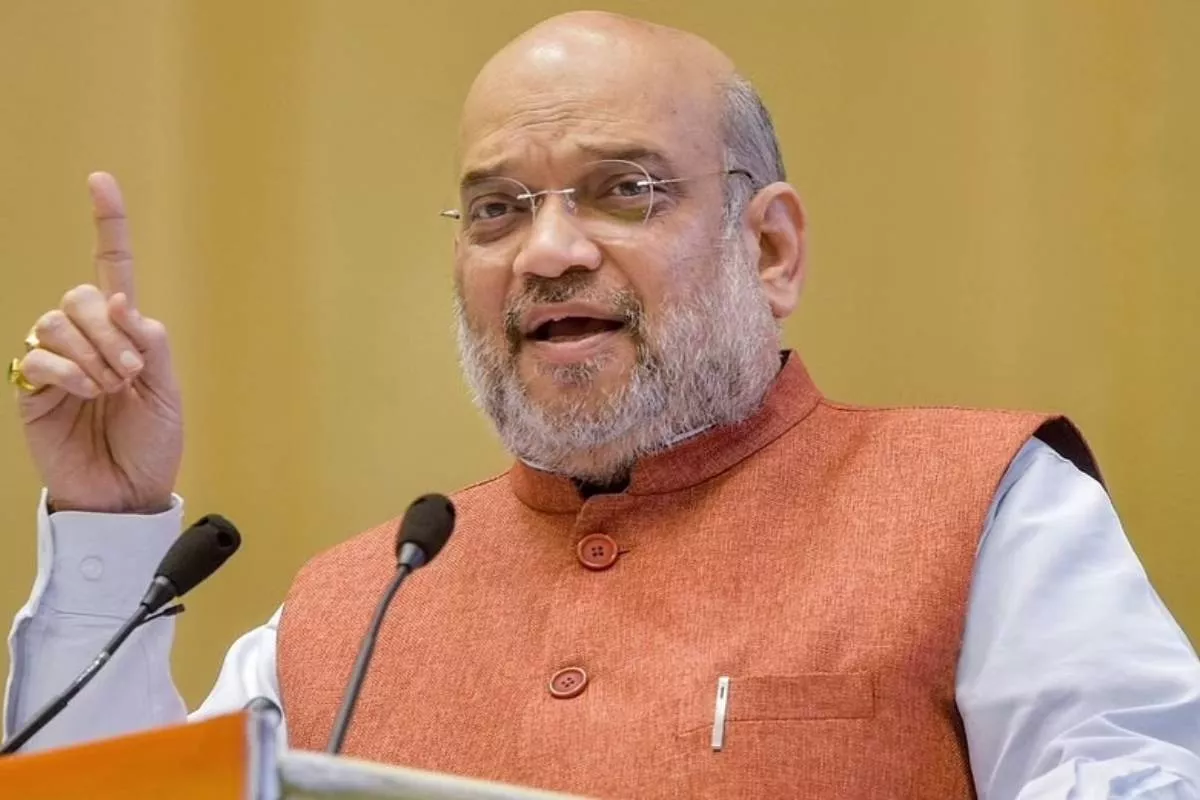 Amit Shah Releases Report Card Of Madhya Pradesh BJP Government - Sakshi