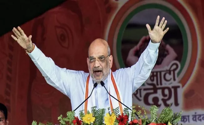 Union Home Minister Amit Shah on warned that Bihar areas close to the borders - Sakshi