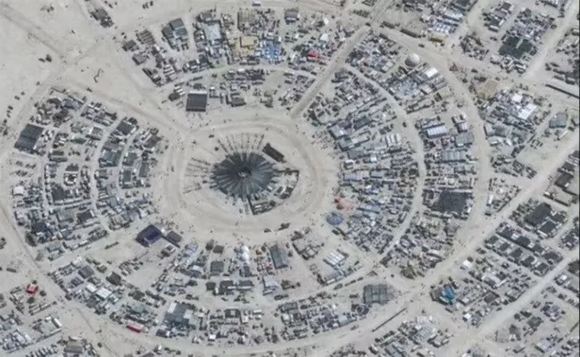 Burning Man storm traps 70000 revellers in Nevada - Sakshi