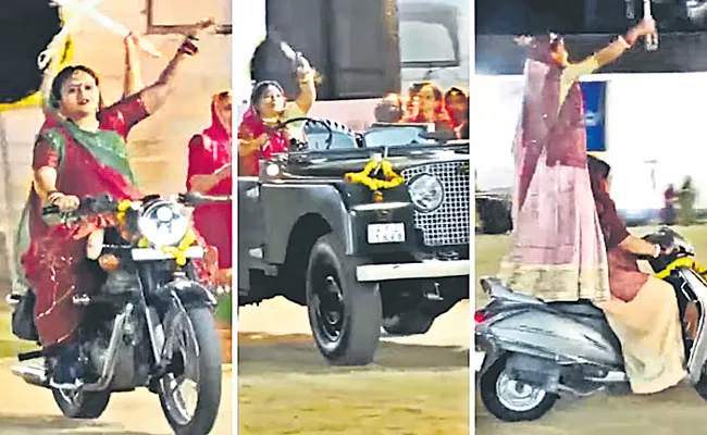 Women perform with swords while riding bikes, cars during Navratri - Sakshi