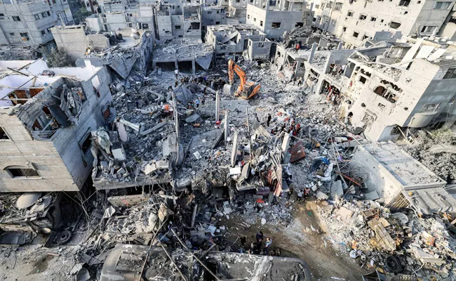 Israel Hamas war: 7000 Palestinians 50 Hostages Killed in Gaza - Sakshi