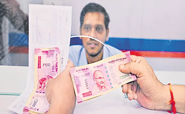 People can send Rs 2,000 notes by post to RBI offices for direct credit in bank accounts - Sakshi