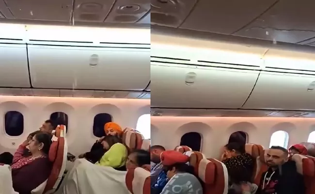 Water Leakage On Air India Flight Video Viral - Sakshi