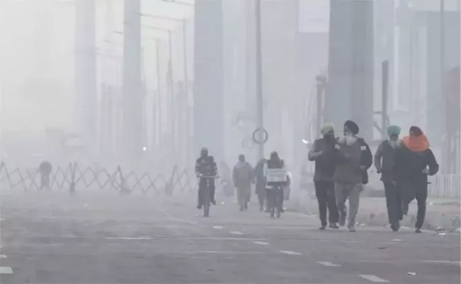 IMD Issued Warning Cold Wave Fog in UP Delhi Rajasthan - Sakshi