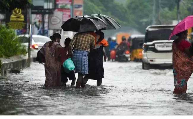 Normal Life Disrupted In Talmilnadu Due To Heavy Rains - Sakshi