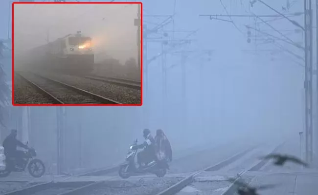 24 Trains To Delhi Delayed Due To Low Visibility - Sakshi