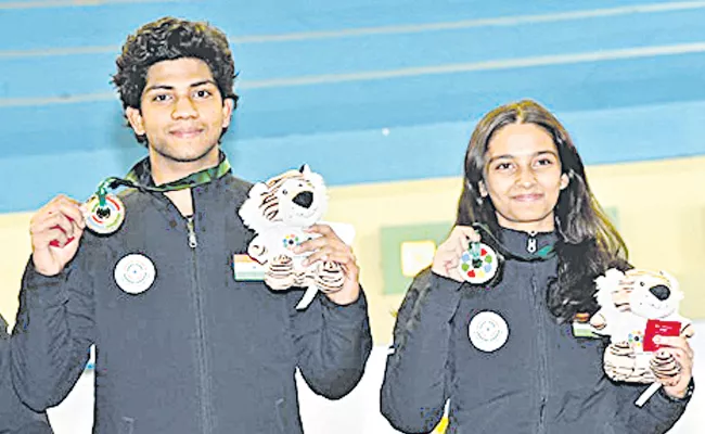 World Cup Junior Shooting: AP Uma Mahesh 2nd Gold Medal - Sakshi