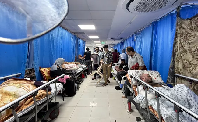 Israel-Hamas war: Israeli forces raid Gaza largest hospital amid escalating conflict - Sakshi