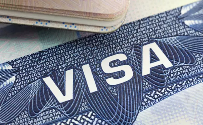 US hikes visa fees for various categories of non-immigrant visas - Sakshi
