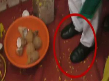 minister kamineni srinivas wear shoes during pooja