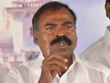 ysrcp leader golla baburao demands to mla anitha withdrawal of case over political punch ravikiran