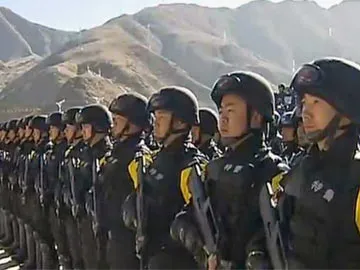 China moves troops, lots of heavy equipment to Tibet, say reports