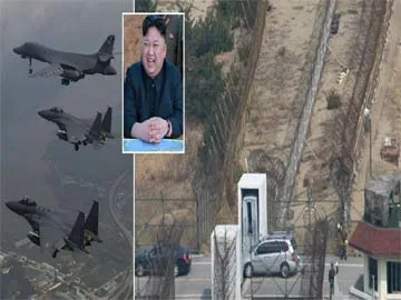 South Korea to drop bombs on border in 'show of overwhelming force' after North sends missile over Japan