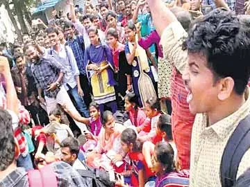 Local candidates fuss during the Karnataka banking exam