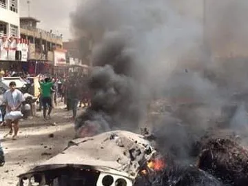Suicide bomb and gun attacks on Iraqi restaurant and police chekpost