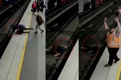 commuters rush to save Faint Man collapse on Railway Track