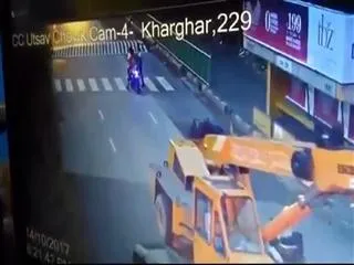 Mumbai Woman crushed by crane after she loses scooter balance
