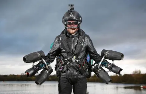 real life iron man sets jet suit speed record - Sakshi