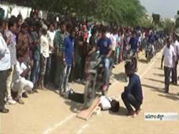 1016 bike ride on Stomach in 18:44 seconds  record - Sakshi