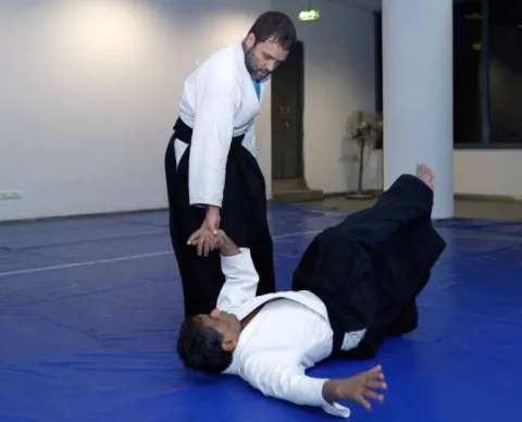 Rahul Gandhi had  black belt in Aikido - Sakshi