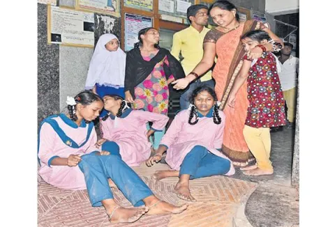 Residential female students who are ill by teacher punishment - Sakshi