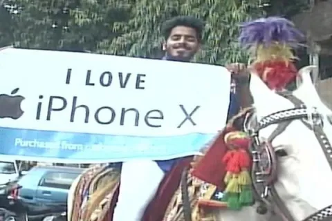 Mumbai Man Horse ride to receive iPhone x - Sakshi