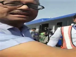 IndiGo staff manhandle a passenger at Delhi's Indira Gandhi International Airport - Sakshi