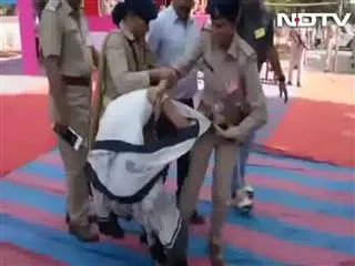 Woman Dragged in Vijay Rupani Meeting Video Viral - Sakshi