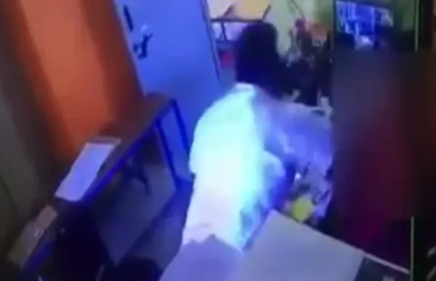 BJP leader caught on CCTV assaulting headmistress over financial dispute - Sakshi