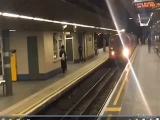 idiot leaps across train tracks - Sakshi