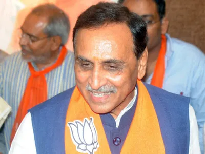 Vijay Rupani frontrunner for Gujarat chief minister - Sakshi