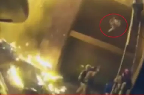 Fearless firefighter captain Scott Stroup catches baby - Sakshi