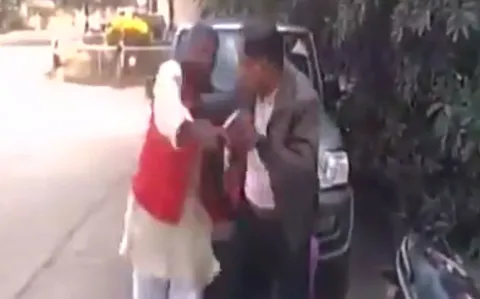 BJP leader Rajdhani Yadav slaps District transport officer - Sakshi