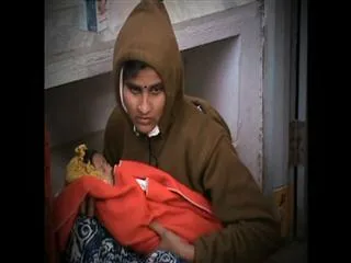 Parents leave their baby kid in rtc bus stand - Sakshi