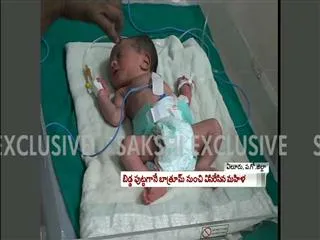 Mother throws new born baby from bathroom window - Sakshi